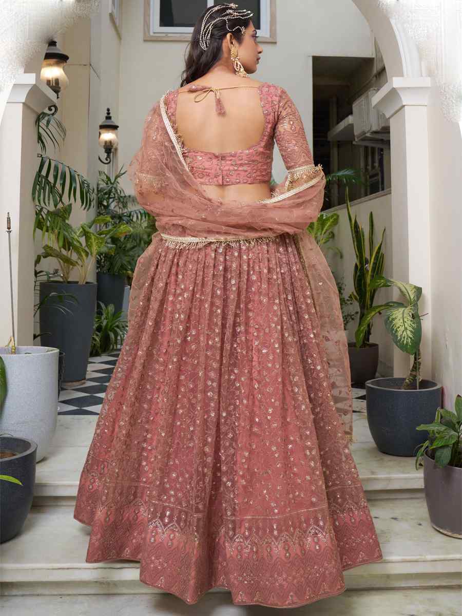 Rust Butterfly Net Embroidery Reception Party Wear Heavy Border Lehenga Choli