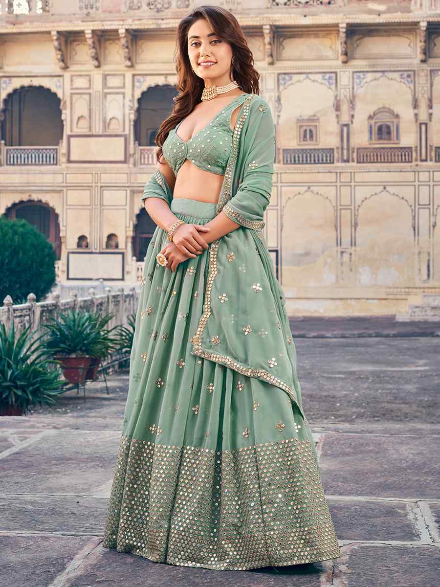 Sea Green Georgette Embroidered Reception Wedding Heavy Border Lehenga Choli