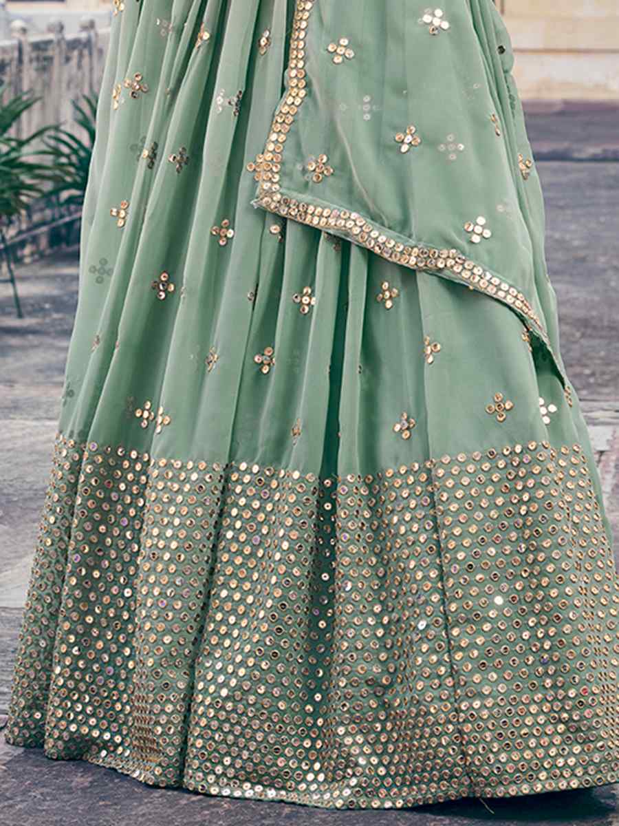 Sea Green Georgette Embroidered Reception Wedding Heavy Border Lehenga Choli