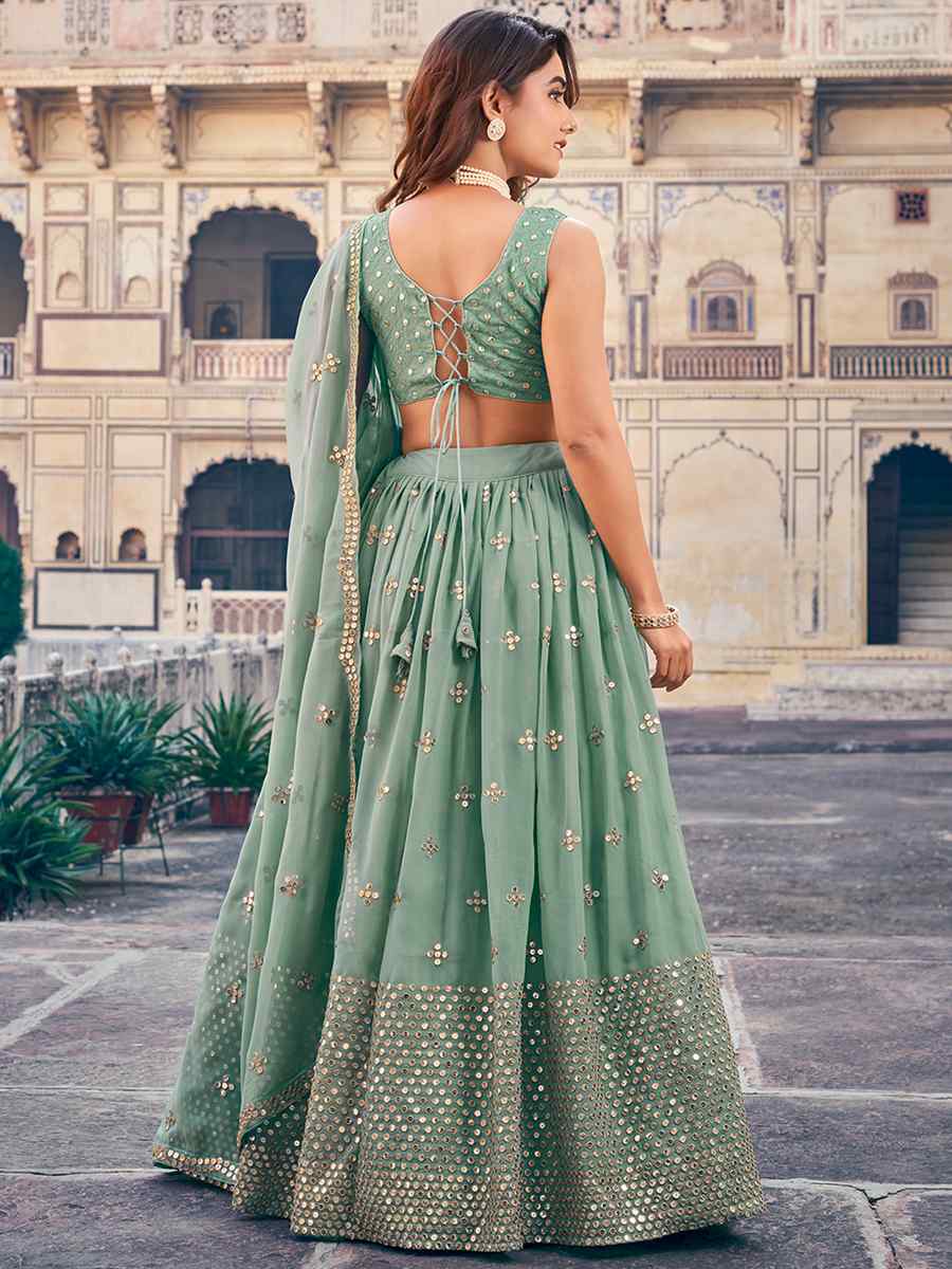 Sea Green Georgette Embroidered Reception Wedding Heavy Border Lehenga Choli