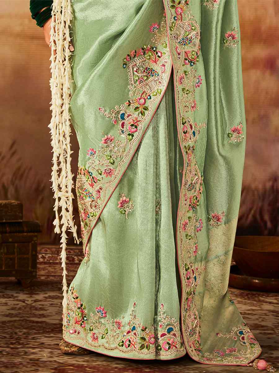 Green Silk Saree With Heavy Embroidered Border