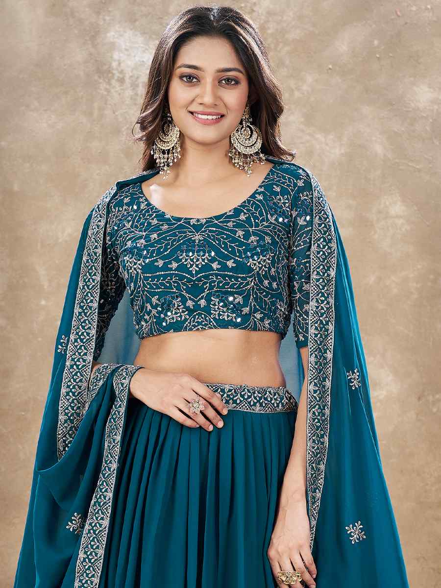 Teal Faux Georgette Embroidery Reception Party Wear Heavy Border Lehenga Choli