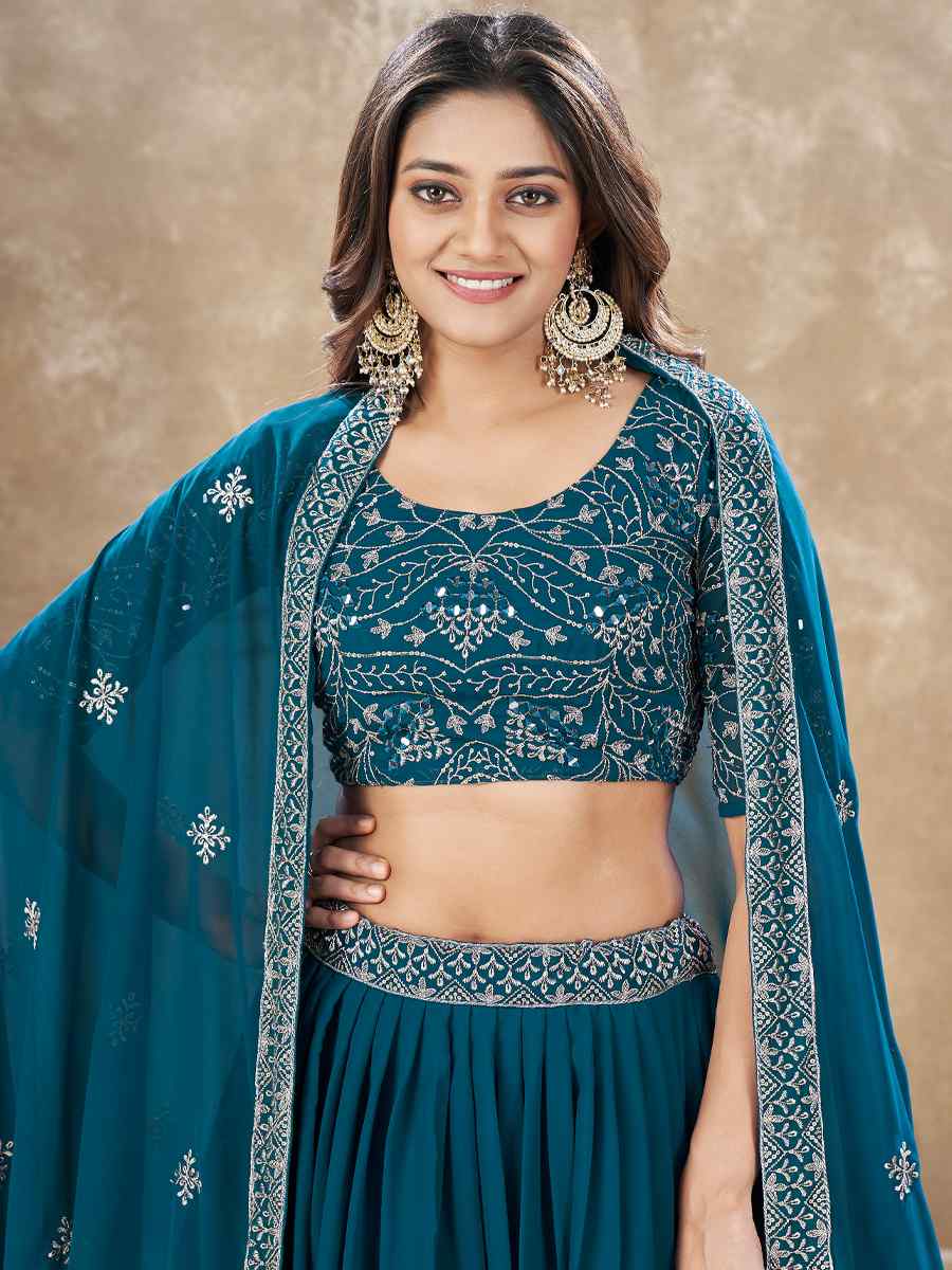 Teal Faux Georgette Embroidery Reception Party Wear Heavy Border Lehenga Choli