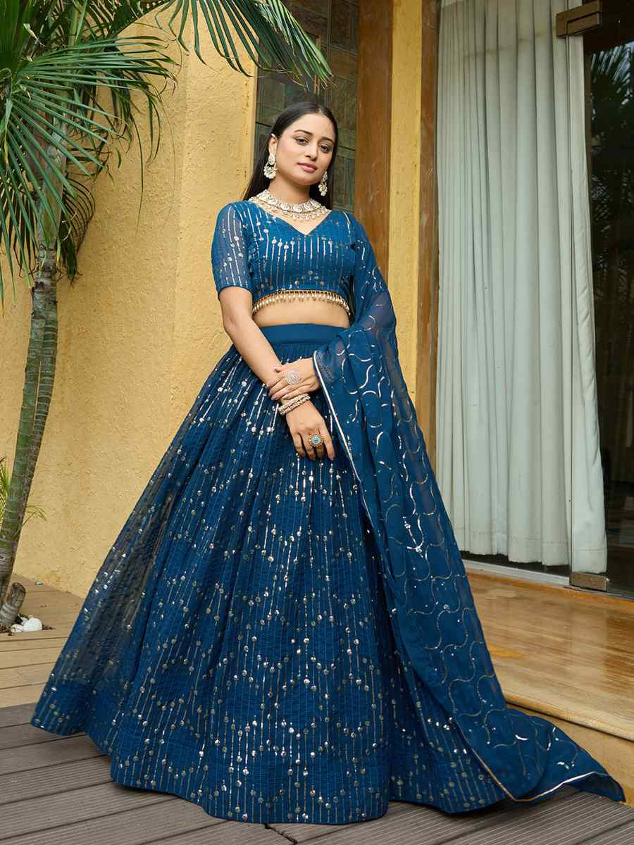 Turquoise Georgette Embroidered Wedding Party Wear Heavy Border Lehenga Choli