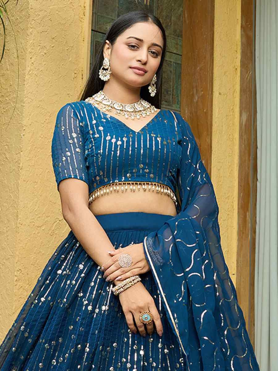 Turquoise Georgette Embroidered Wedding Party Wear Heavy Border Lehenga Choli