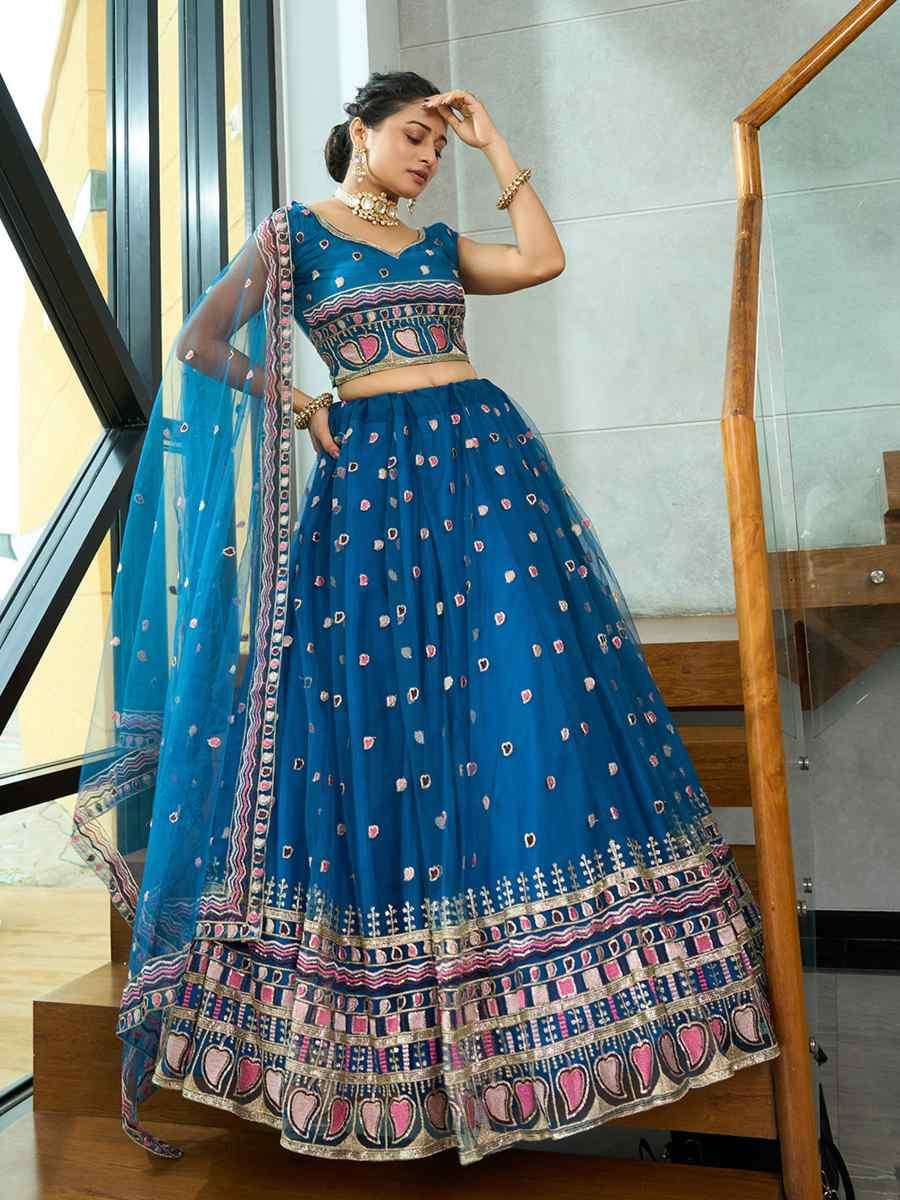 Turquoise Georgette Embroidered Wedding Party Wear Heavy Border Lehenga Choli