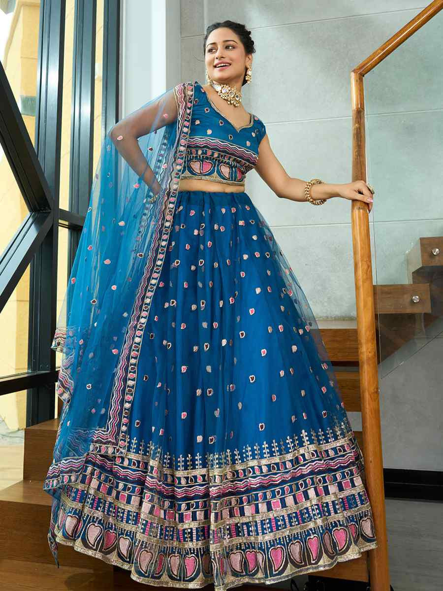 Turquoise Georgette Embroidered Wedding Party Wear Heavy Border Lehenga Choli