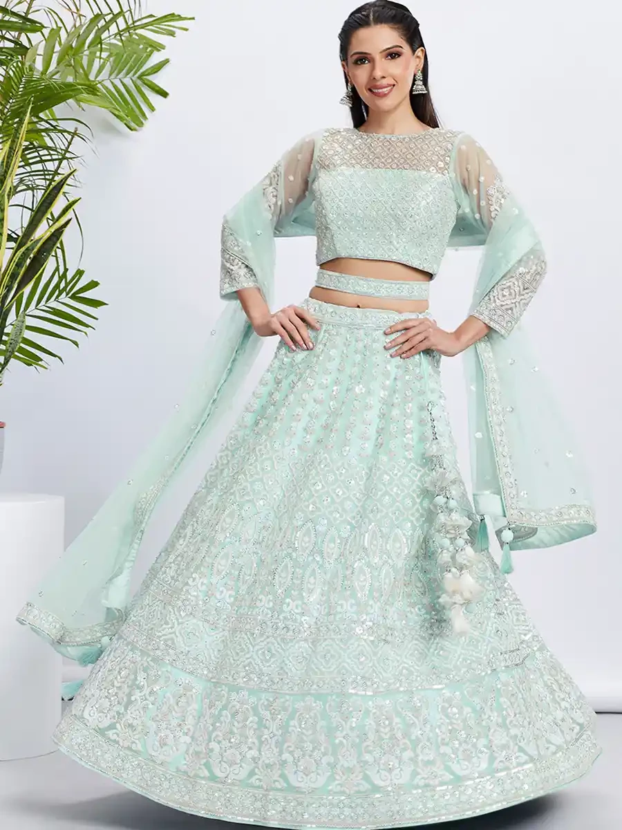 Turquoise Net Embroidery Reception Party Wear Heavy Border Lehenga Choli