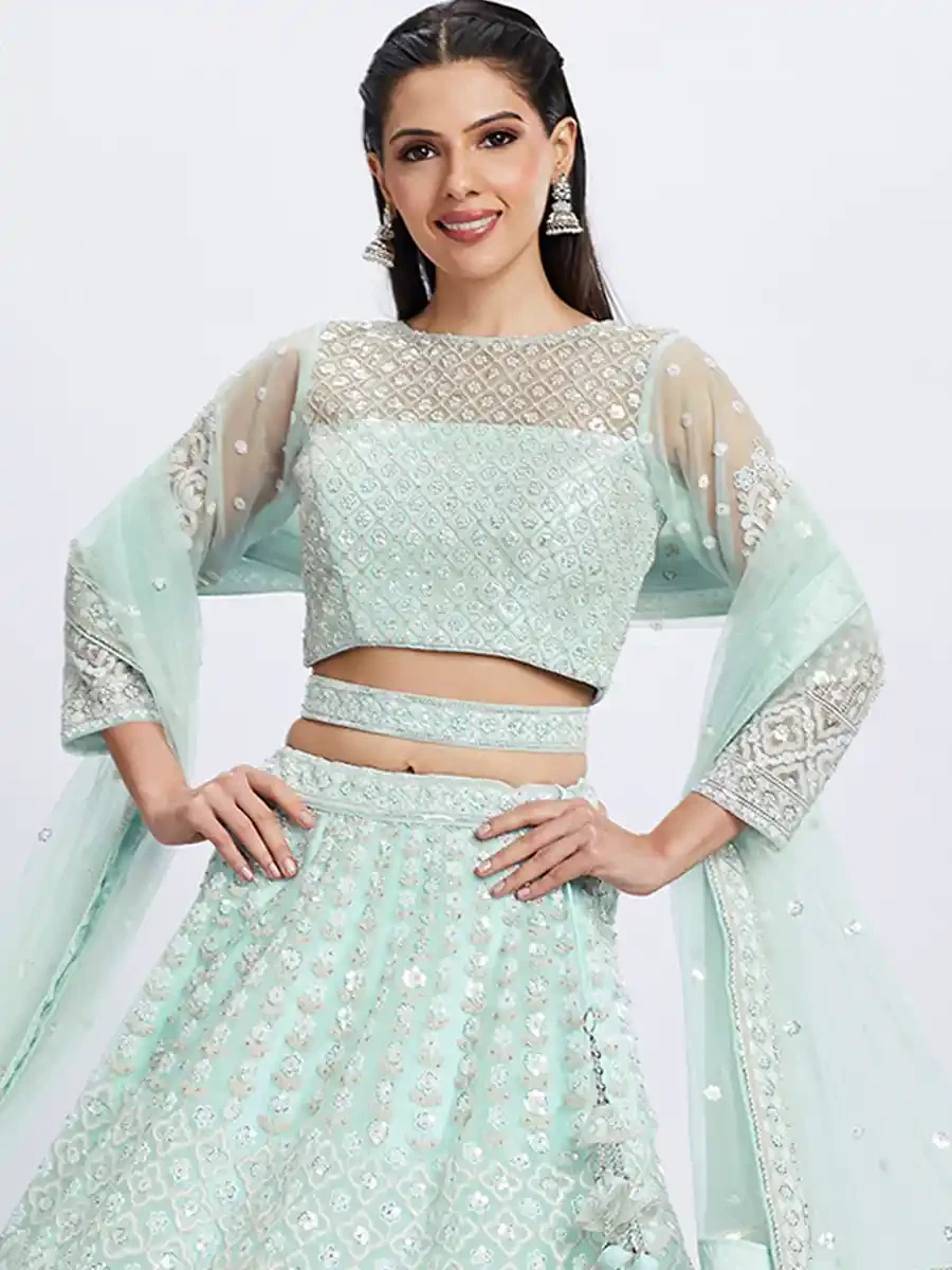 Turquoise Net Embroidery Reception Party Wear Heavy Border Lehenga Choli