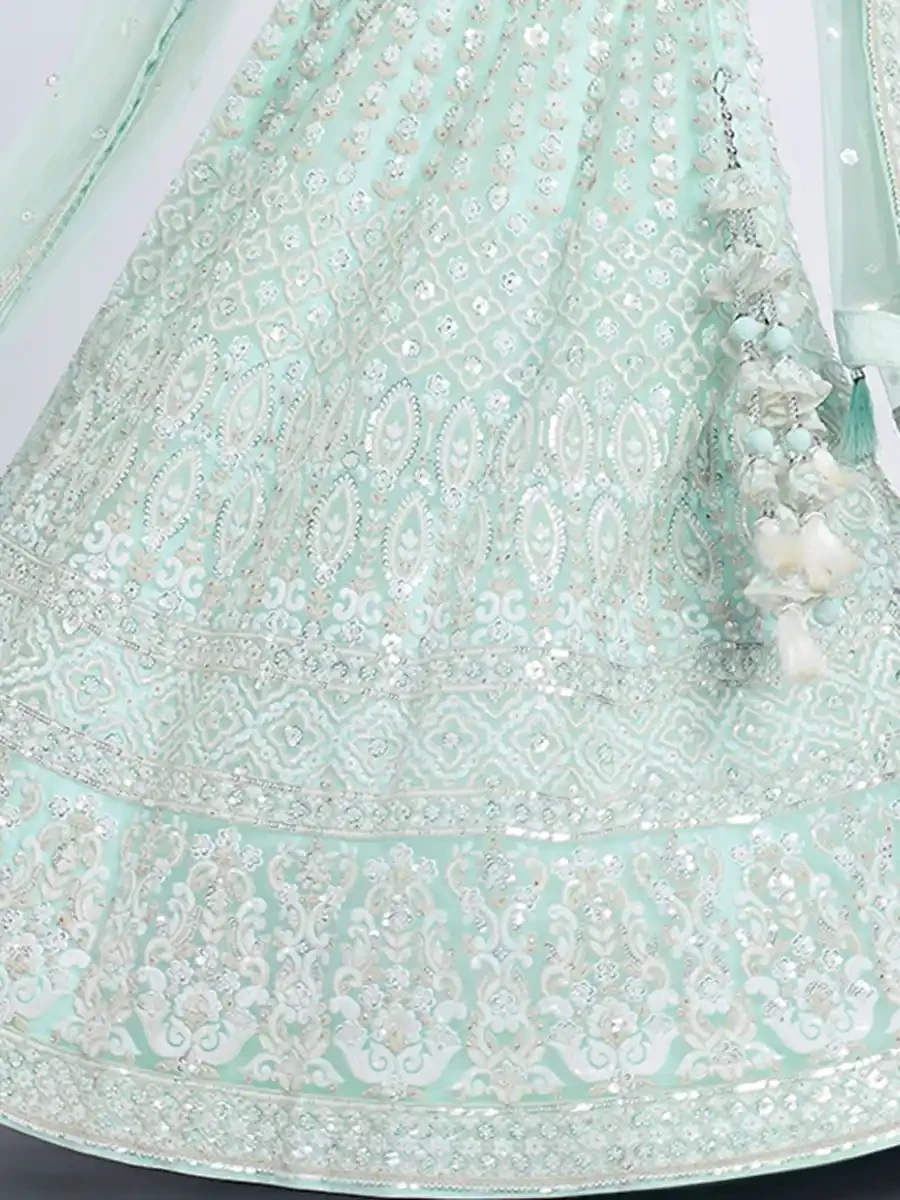 Turquoise Net Embroidery Reception Party Wear Heavy Border Lehenga Choli