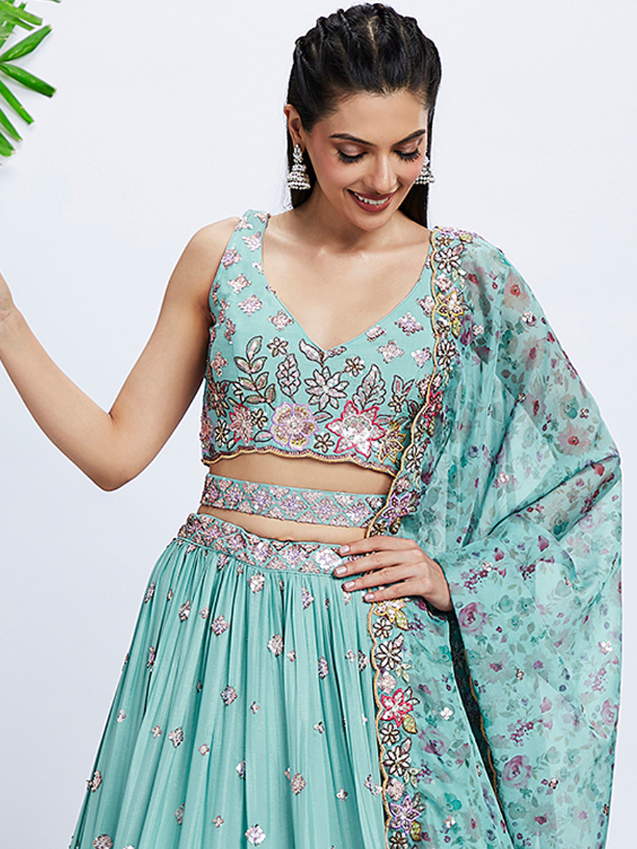 Turquoise Silk Chiffon Embroidered Reception Party Wear Heavy Border Lehenga Choli