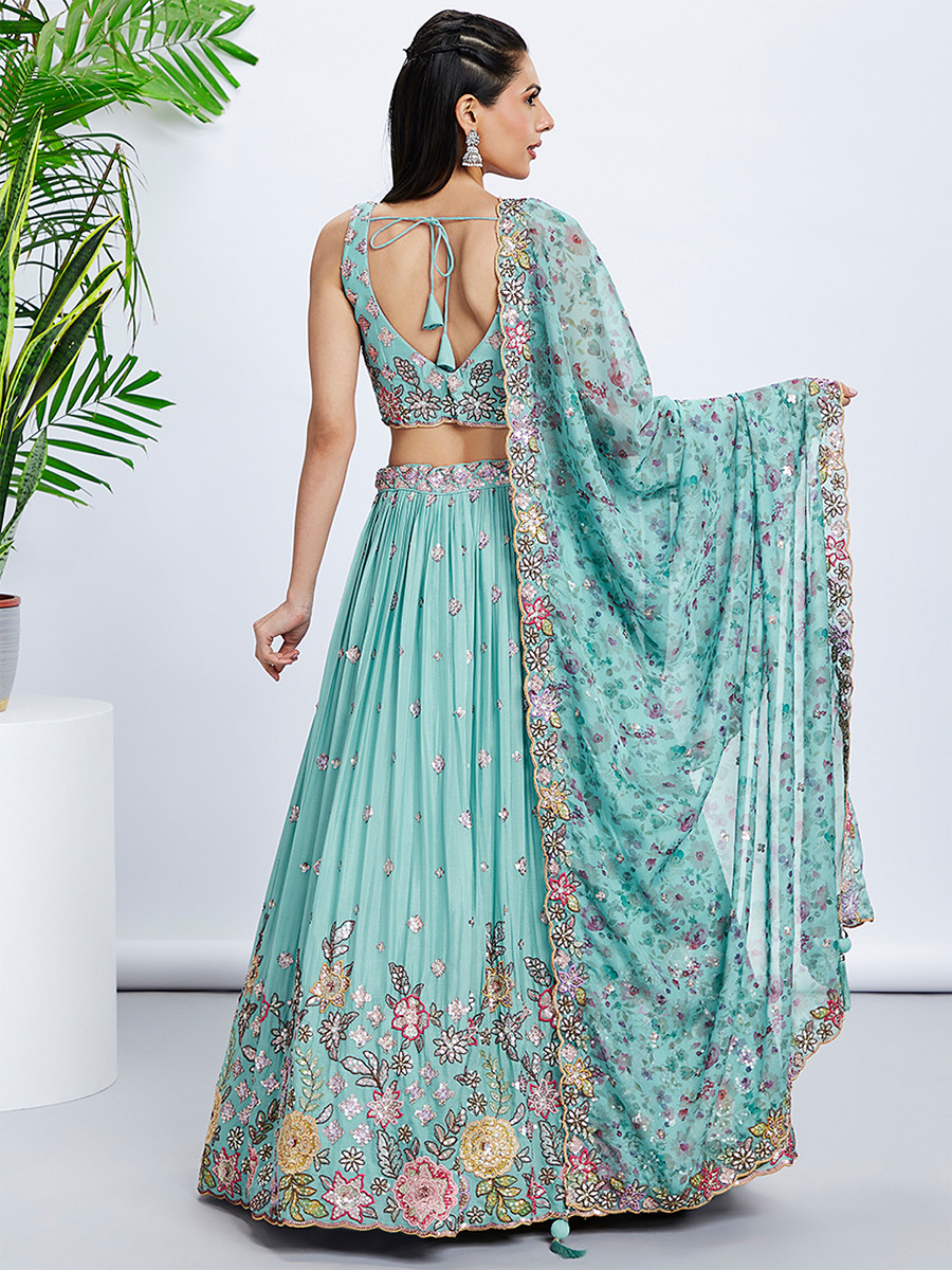 Turquoise Silk Chiffon Embroidered Reception Party Wear Heavy Border Lehenga Choli