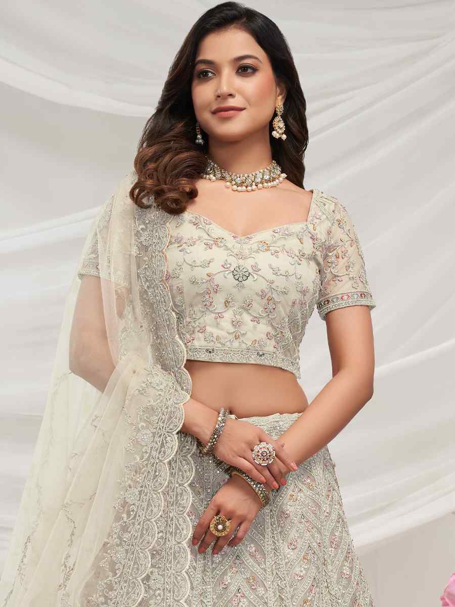 White Soft Net Embroidered Bridesmaid Wedding Heavy Border Lehenga Choli