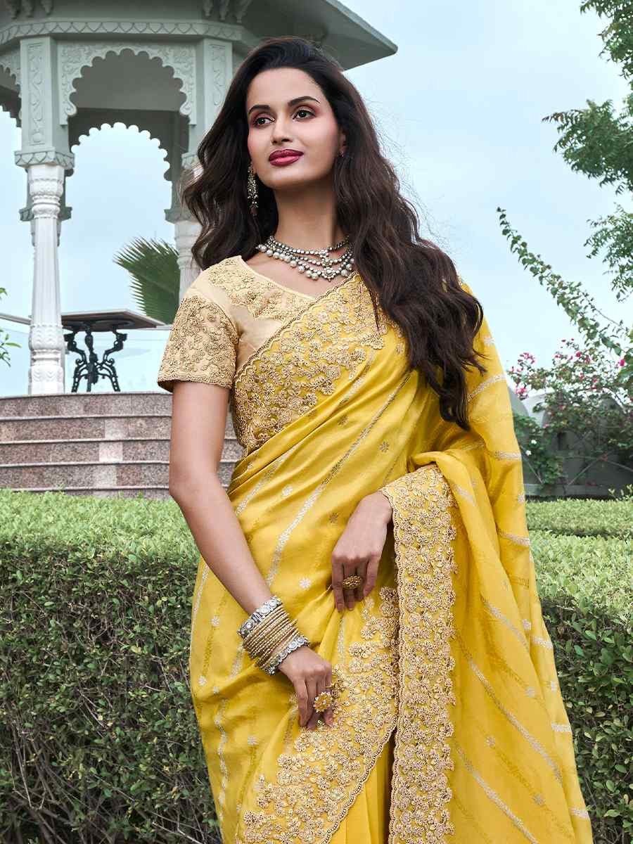 Yellow Pure Tissue Silk Embroidered Reception Wedding Heavy Border Saree