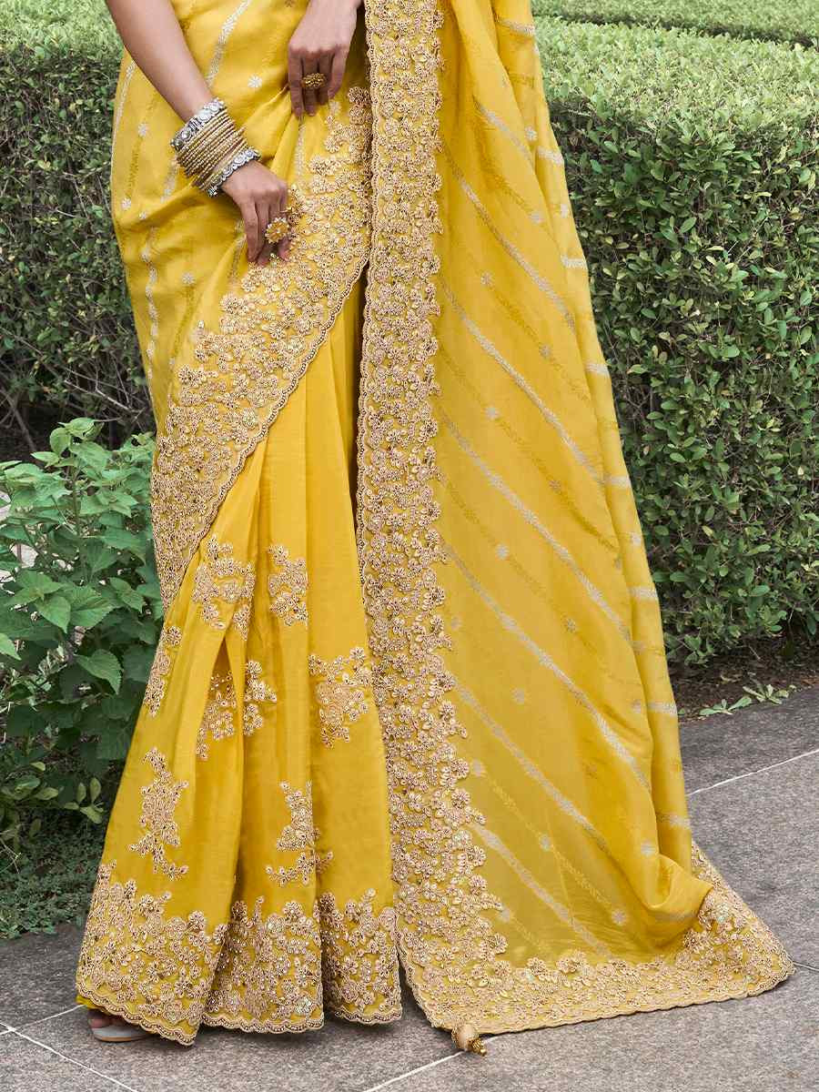 Yellow Pure Tissue Silk Embroidered Reception Wedding Heavy Border Saree