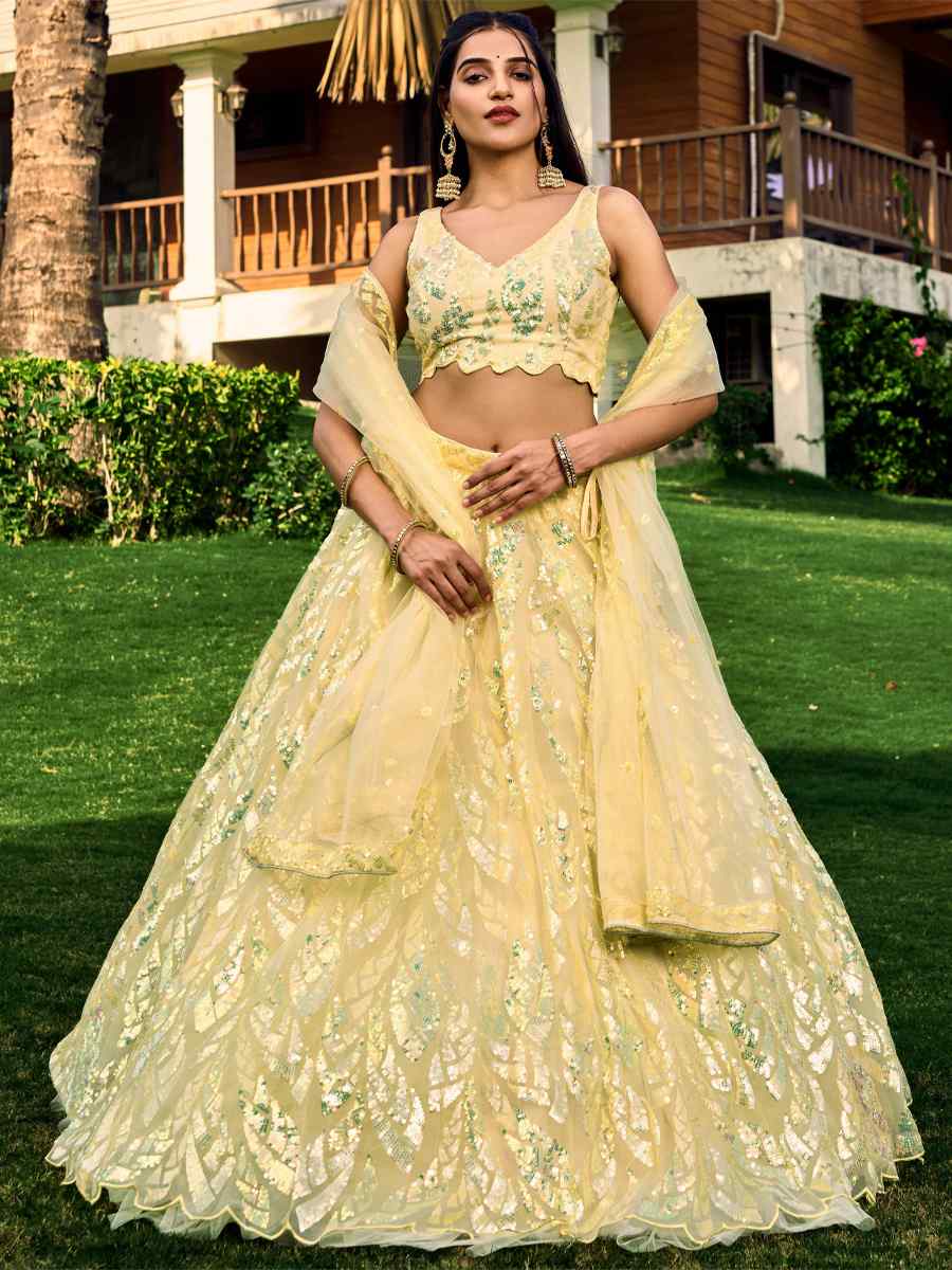 Yellow Soft Net Embroidered Bridesmaid Wedding Heavy Border Lehenga Choli