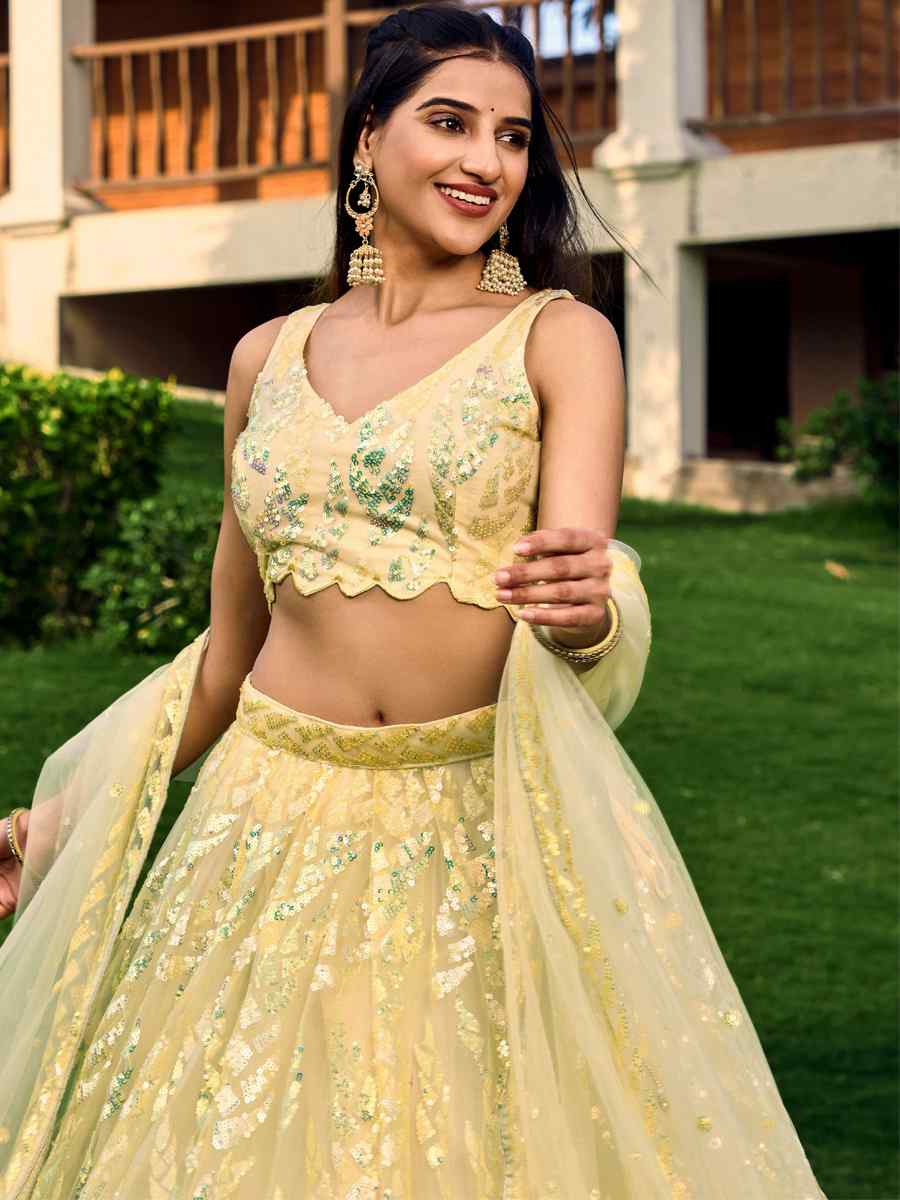 Yellow Soft Net Embroidered Bridesmaid Wedding Heavy Border Lehenga Choli